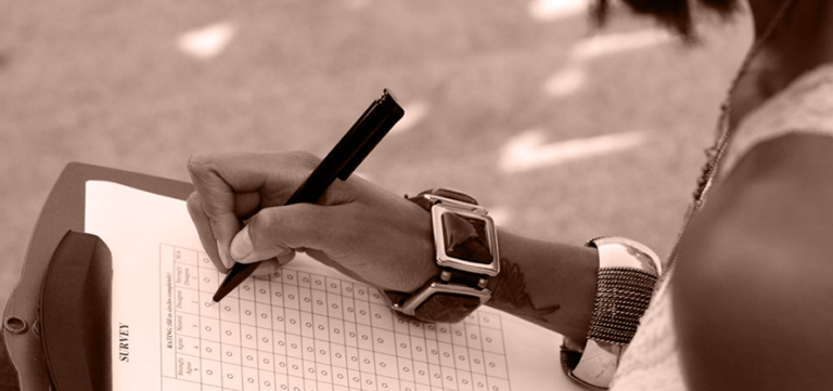 A young woman taking a survey